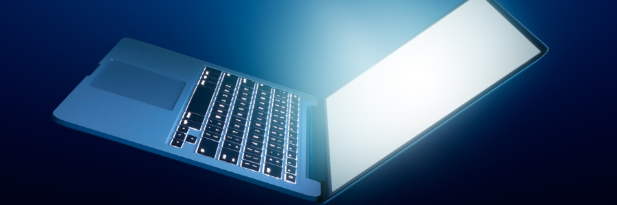 open laptop with glowing screen