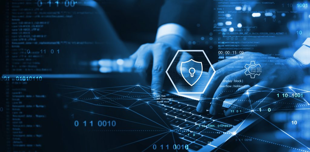 Hands typing on a laptop, overlaid with digital security graphics like a lock and binary code